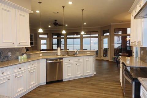 Fully stocked kitchen: Ice maker, dishwasher, toaster, coffee maker, blender