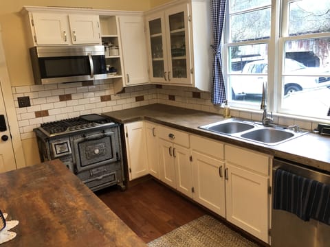updated kitchen...note old stove with gas cooktop