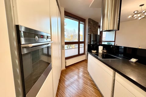 Premium Apartment, 1 Bedroom, Balcony, City View | Private kitchenette | Full-size fridge, oven, stovetop, dishwasher