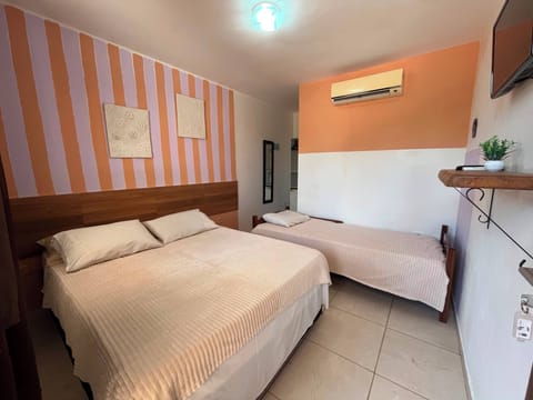 Standard Triple Room, Multiple Beds, Non Smoking | 1 bedroom, blackout drapes, WiFi (free), bed sheets