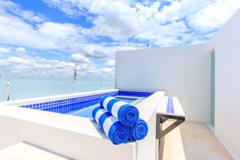 Outdoor pool, pool umbrellas, sun loungers