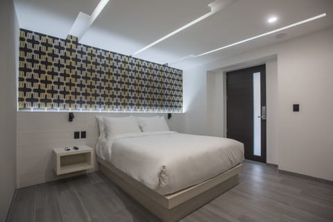 Premium bedding, in-room safe, laptop workspace, soundproofing