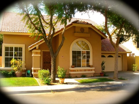 The home is surrounded by beautiful, lush, green tree's.