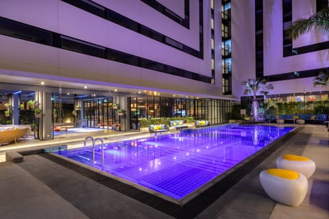 Outdoor pool, pool umbrellas, sun loungers