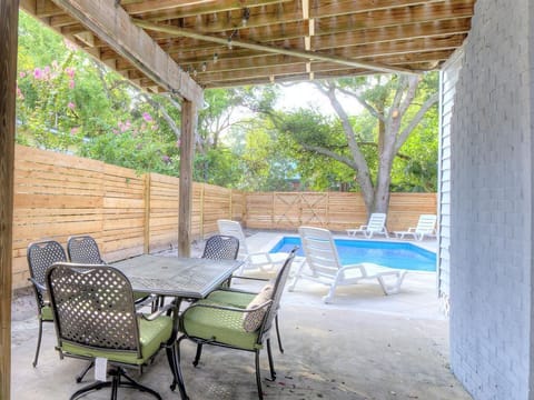 Outdoor patio dining by the pool