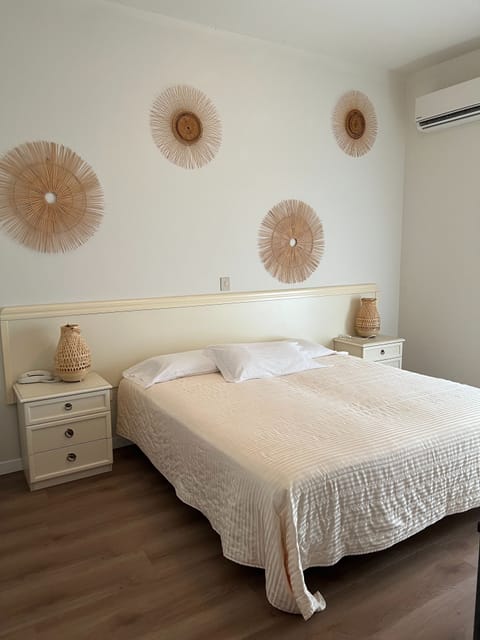 Economy Double Room | Minibar, desk, free WiFi, bed sheets