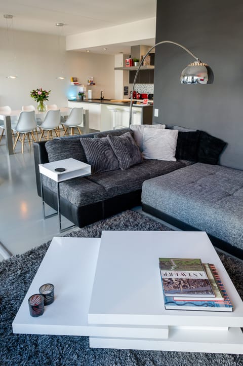Living room opens onto dining area & covered terrace