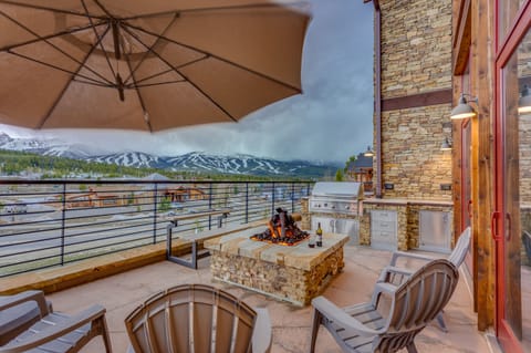 Massive west-facing home-wide patio that is the jewel of the home. Sit around an iron-log gas fireplace with a glass of wine. Grill some steaks while gazing at the mountains on the gourmet grill, or relax in the large modern hot tub.