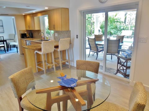 Dine Inside or Outside with the Kitchen Nearby to Make Dining Simple