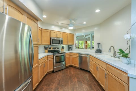 Big kitchen and lots of counter space, open to great room and 2nd dining area.