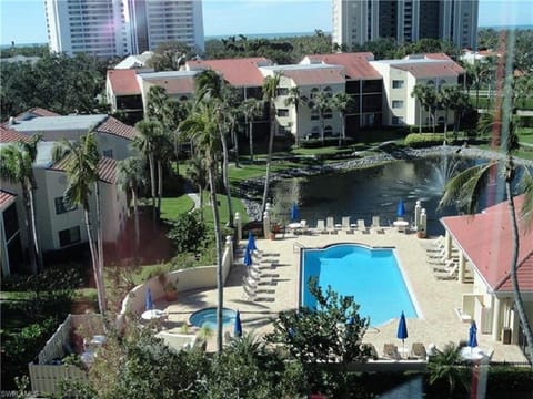 Valencia Clubhouse, pool, hot tub, and lake with water feature