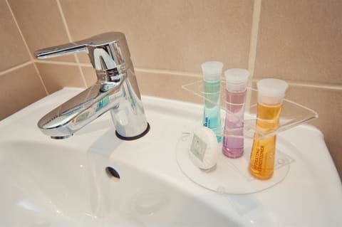 Shower, free toiletries, hair dryer, towels