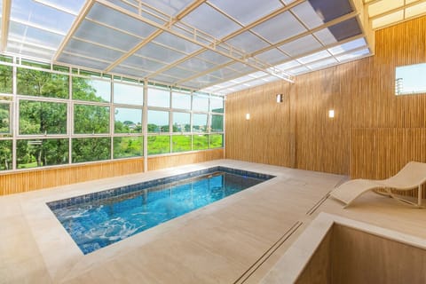 Indoor pool, open 10:00 AM to 10:00 PM, sun loungers