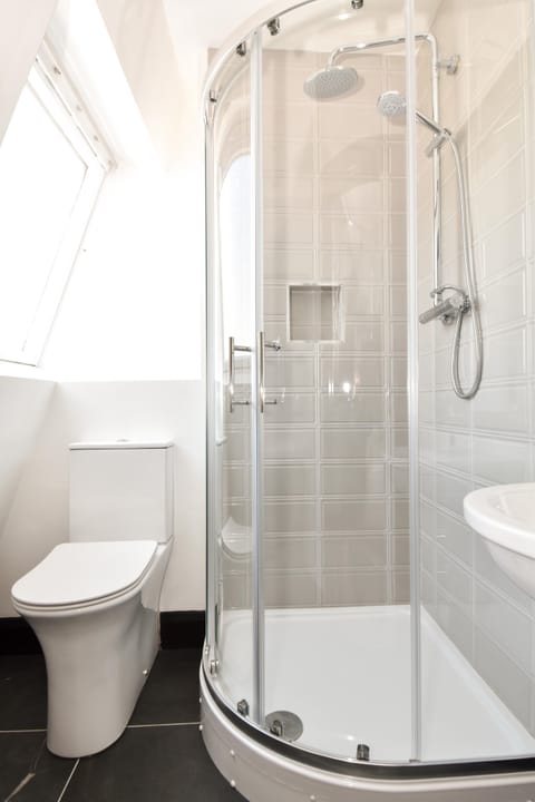 Shower, free toiletries, hair dryer, towels