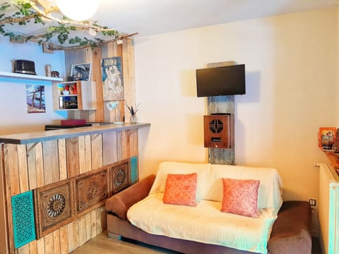 Apartment, 1 Double Bed, Lake View (L'échappée Belle) | Living area | Flat-screen TV