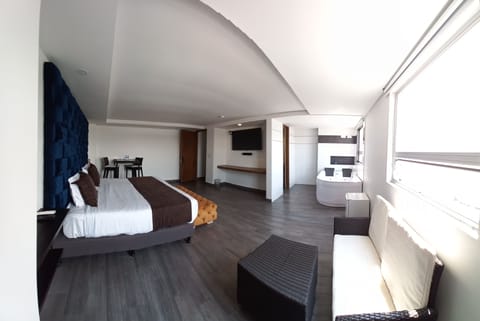 Luxury Suite, 1 King Bed, Non Smoking, City View | Individually decorated, individually furnished, desk, laptop workspace