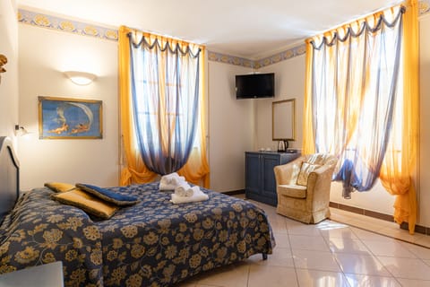 Deluxe Room | 1 bedroom, premium bedding, down comforters, minibar