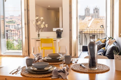 Family Apartment, 1 Bedroom, Balcony, River View | In-room dining