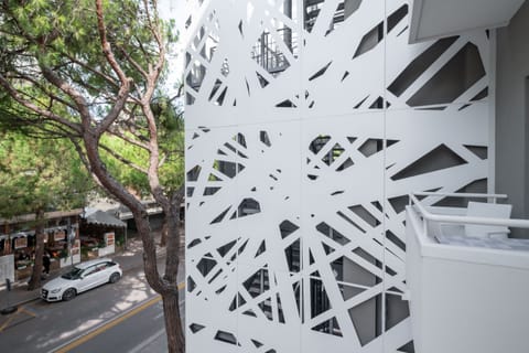 Basic Quadruple Room, Multiple Beds, Balcony | Street view