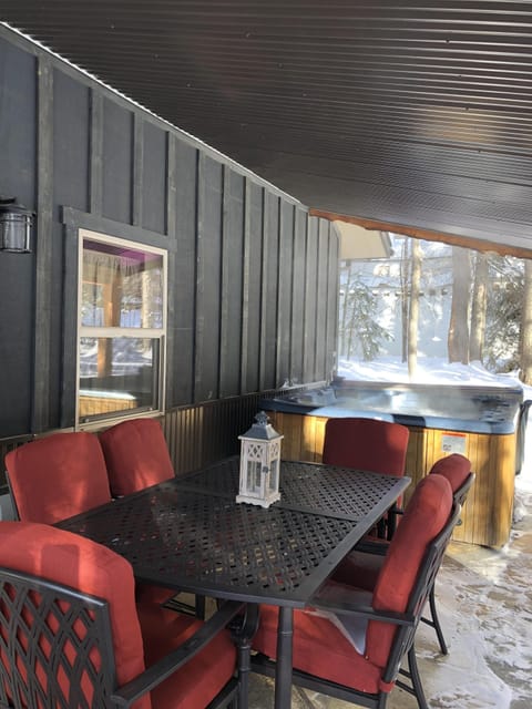 Covered Back Patio with Private Hot Tub.