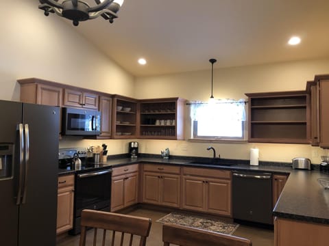 Fully Stocked Gourmet Kitchen.