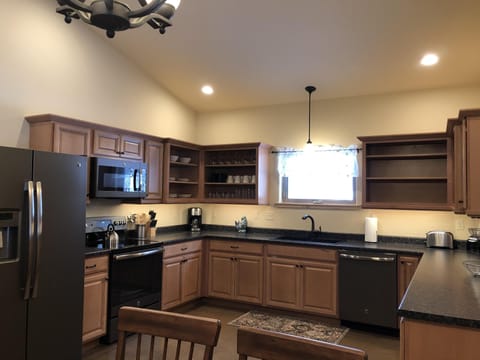 Fully Stocked Gourmet Kitchen.