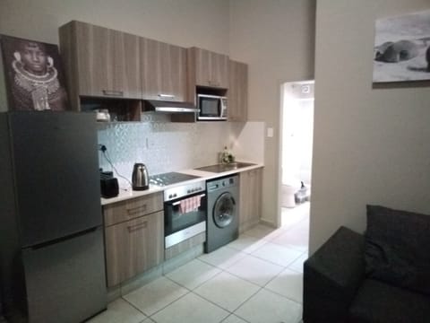 Family Apartment, 2 Bedrooms | Private kitchen | Fridge, microwave, oven, stovetop