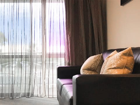 One Bedroom Suite | Laptop workspace, blackout drapes, soundproofing, iron/ironing board