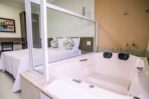 Superior Suite, 1 Queen Bed, Non Smoking | Minibar, iron/ironing board, free WiFi, bed sheets