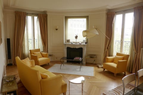 Dining room is bathed in light by 2 full height windows