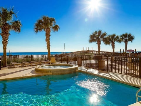 Swim through pool that is heated in cooler months. Hot tub with beach view.