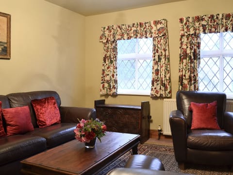 Cosy living room with wood burner | Tudor House, Easingwold, near York