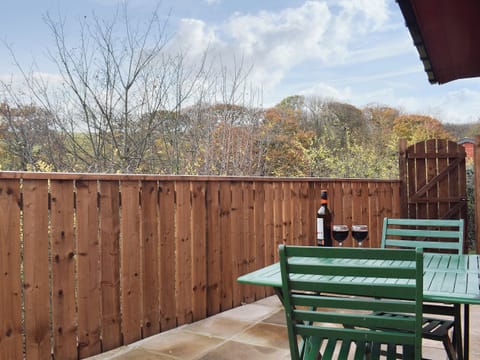 Lovely paved sitting out area | Pheasant Lodge, Staithes, near Whitby