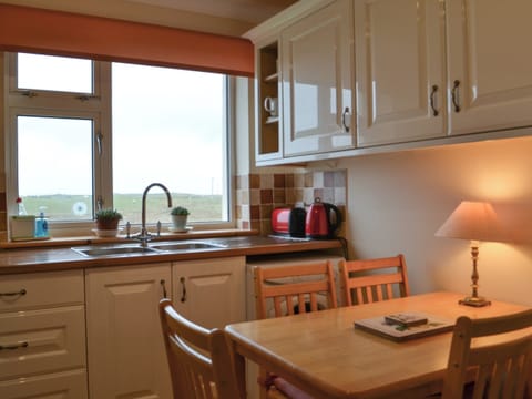 Kitchen with dining area | Padraig’s Cottage, Howbeg (Tobha Beag), Isle of South Uist