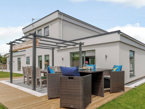 Relaxing patio area | Rosedene, Colwell Bay, near Yarmouth