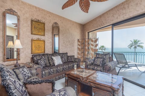 RICH FURNISHINGS IN THE LIVING ROOM.