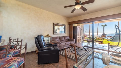 Living room with recliner and sofa.
