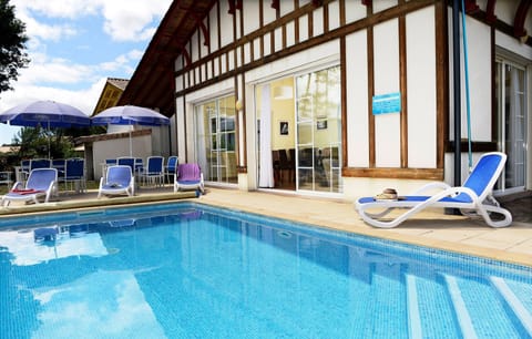 Take a dip in the shared outdoor pool.
