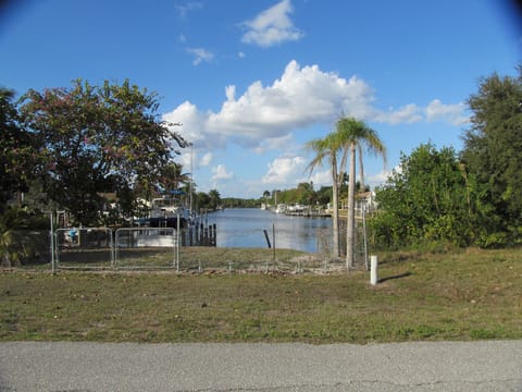 River view via front porch & channel to the Caloosahatchee River