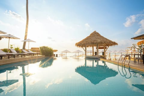 Outdoor pool, open 8 AM to 8 PM, pool umbrellas, sun loungers