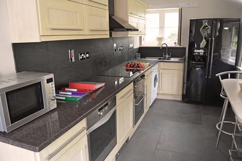 Ground floor: Farmhouse kitchen with breakfast bar