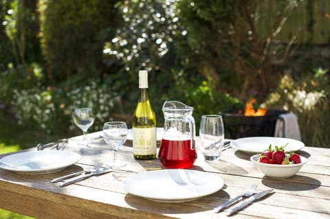 Longships apartment opens onto the garden and BBQ area.