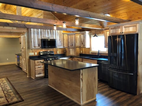 Beautiful fully stocked kitchen with brand new GE Profile appliances. 