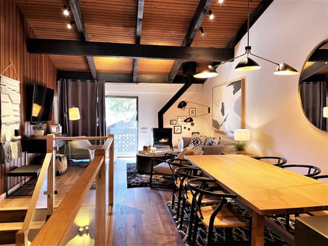 Overall view of the upper level from the Kitchen towards Dining and Living Room.