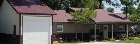 Water front lake house, dock, fire pit, and large screened in deck!