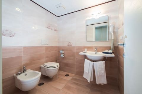 Deluxe Room, Sea View | Bathroom | Shower, hair dryer, slippers, towels