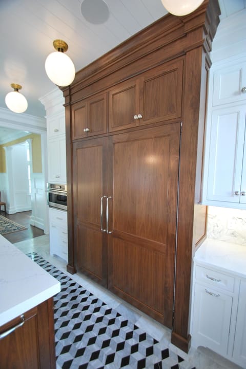 Walnut encased commercial grade freezer and refrigerator.  