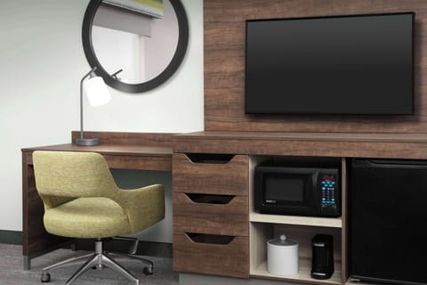 Desk, laptop workspace, blackout drapes, iron/ironing board