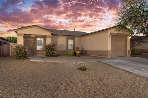 Exterior view of the home`s front door entrance and single-car garage