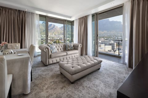 Executive Suite, 2 Bedrooms | Living area | 55-inch Smart TV with satellite channels